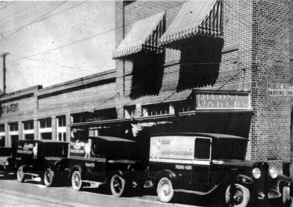 Three delivery trucks in front of the Biloxi Bakery and Confectioneries. known by the locals as simply Klein's. For over sixty years it supplied the Biloxi - Gulfport - Ocean Springs areas with fresh baked goods. Fred Klein Sr., the founder, claims when he left New Orleans at the turn of the century, they forgot how to make REAL french bread ... He had backup for his claims as some of the deliveries were made to New Orleans!  His bread was even flown to California and New York when visiting dignitaries from the local air base were in town!
